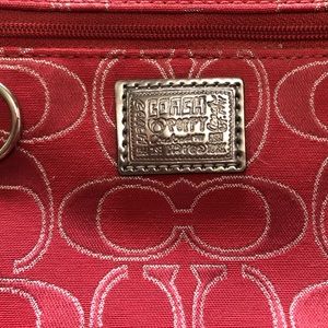 Pink and red logo print Coach wristlet